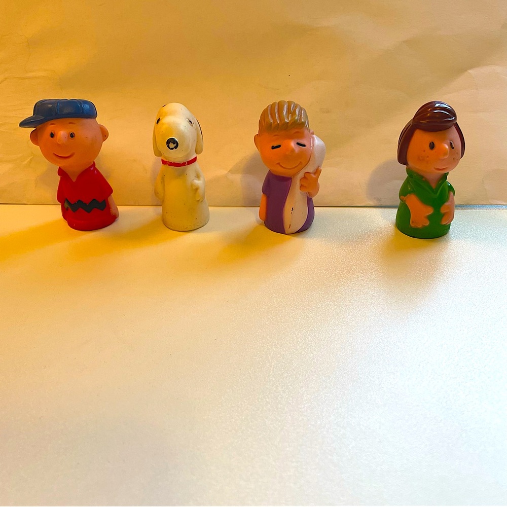 Set of 4 Peanuts figures Charlie Brown, Snoopy, Linus, and Lucy from 1950s